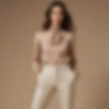 A fashionable outfit featuring beige fabric trousers paired with a chic top.