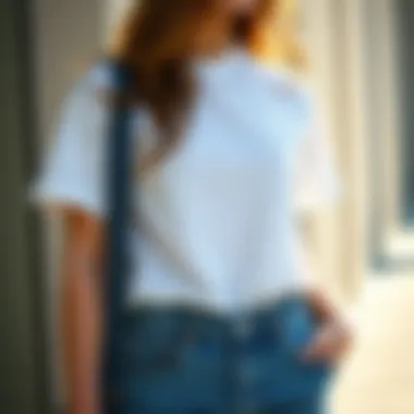 Casual outfit featuring a white t-shirt with denim jeans
