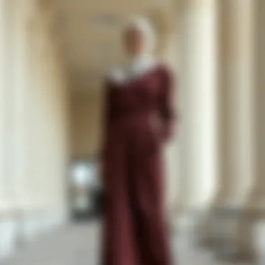 Sophisticated hijab fashion featuring a chic floor-length dress