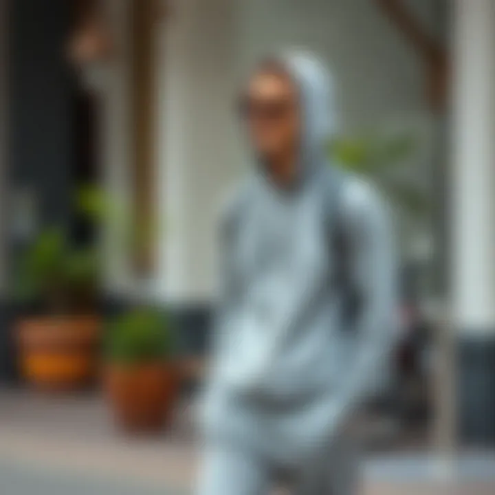 Casual gray tracksuit paired with accessories