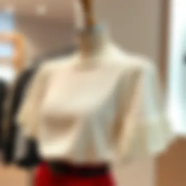 Elegant knitted blouse showcased on a stylish mannequin