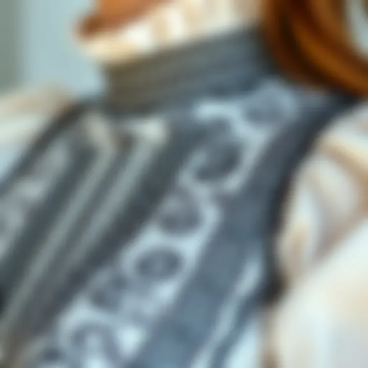Close-up of intricate patterns on a thick-strapped blouse.