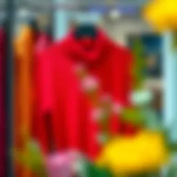 A vibrant red turtleneck sweater displayed elegantly on a hanger.