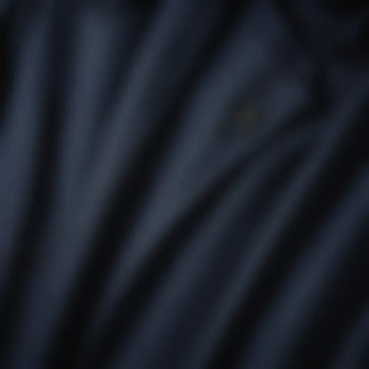 Close-up of fabric texture showcasing the quality of navy trench coat material