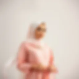 Elegant modern hijab evening dress in soft pastel tones