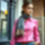 Elegant pink shirt styled with a chic scarf