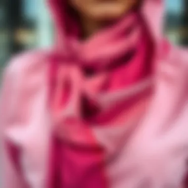 Close-up of color harmony between pink and scarf