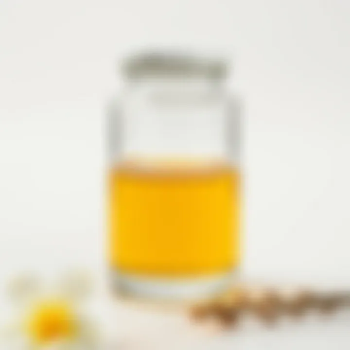 A clear glass jar filled with a golden oil, emphasizing its purity.