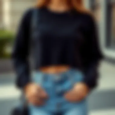 Chic Black Crop Sweater and High-Waisted Jeans Elegant black crop sweater styled with high-waisted jeans