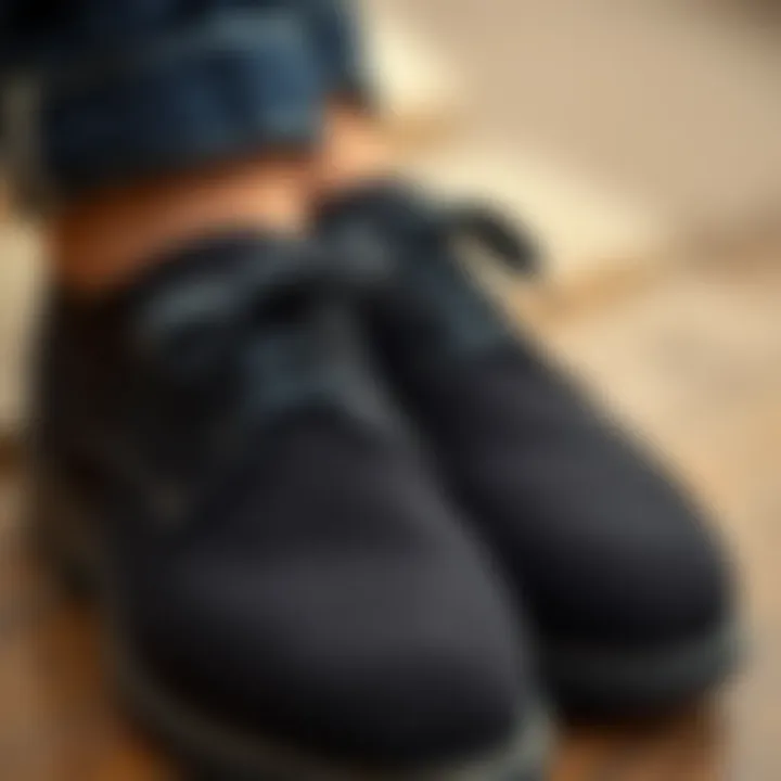 A close-up of the texture and detailing of black linen shoes showcasing their quality