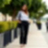 Elegant black fabric pants and light shirt combination