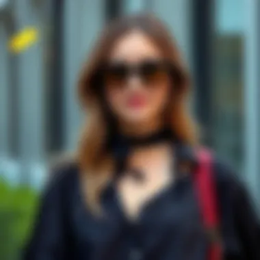 Fashionable outfit with black chiffon shirt and accessories