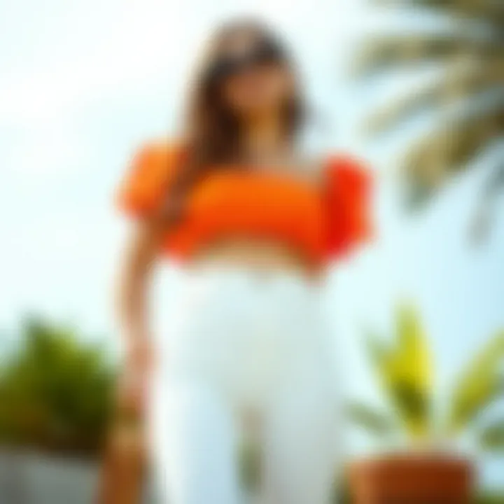 Vibrant orange crop top styled with summer accessories