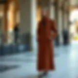 Elegant long modest coat showcasing contemporary fashion trends