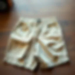 Stylish side pocket shorts displayed on a wooden surface