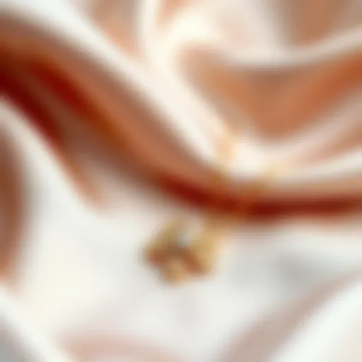 Elegant clover chain necklace showcased on a silk background